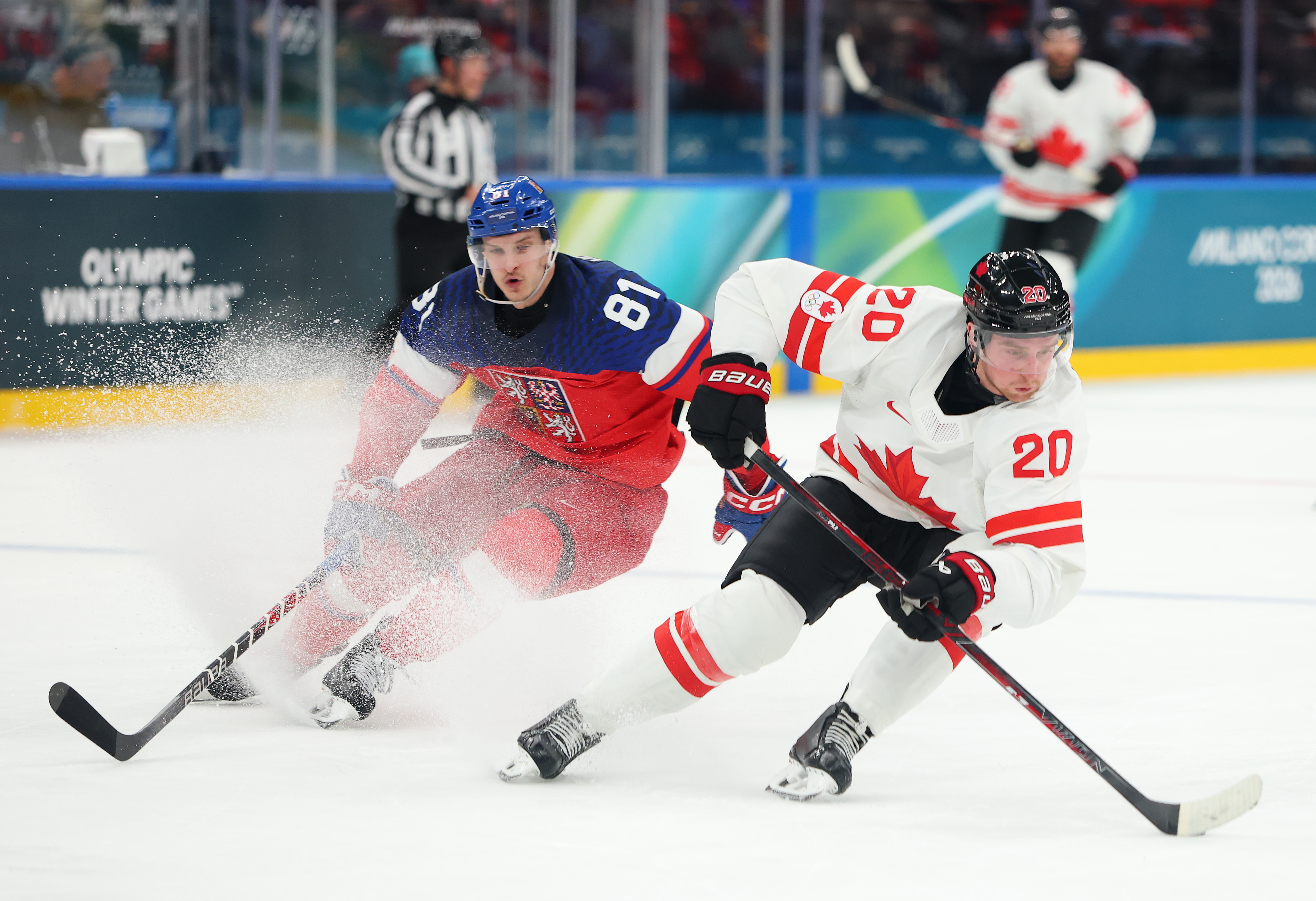 Thomas Harley #20 of Team Canada controls the puck against Dominik Kubalik #81 of Team Czechia in the second period during the Men's Preliminary Group A match between Czechia and Canada on day six of the Milano Cortina 2026 Winter Olympic games at Milano Rho Ice Hockey Arena on Feb. 12, 2026 in Milan, Italy. (Photo by Gregory Shamus/Getty Images)