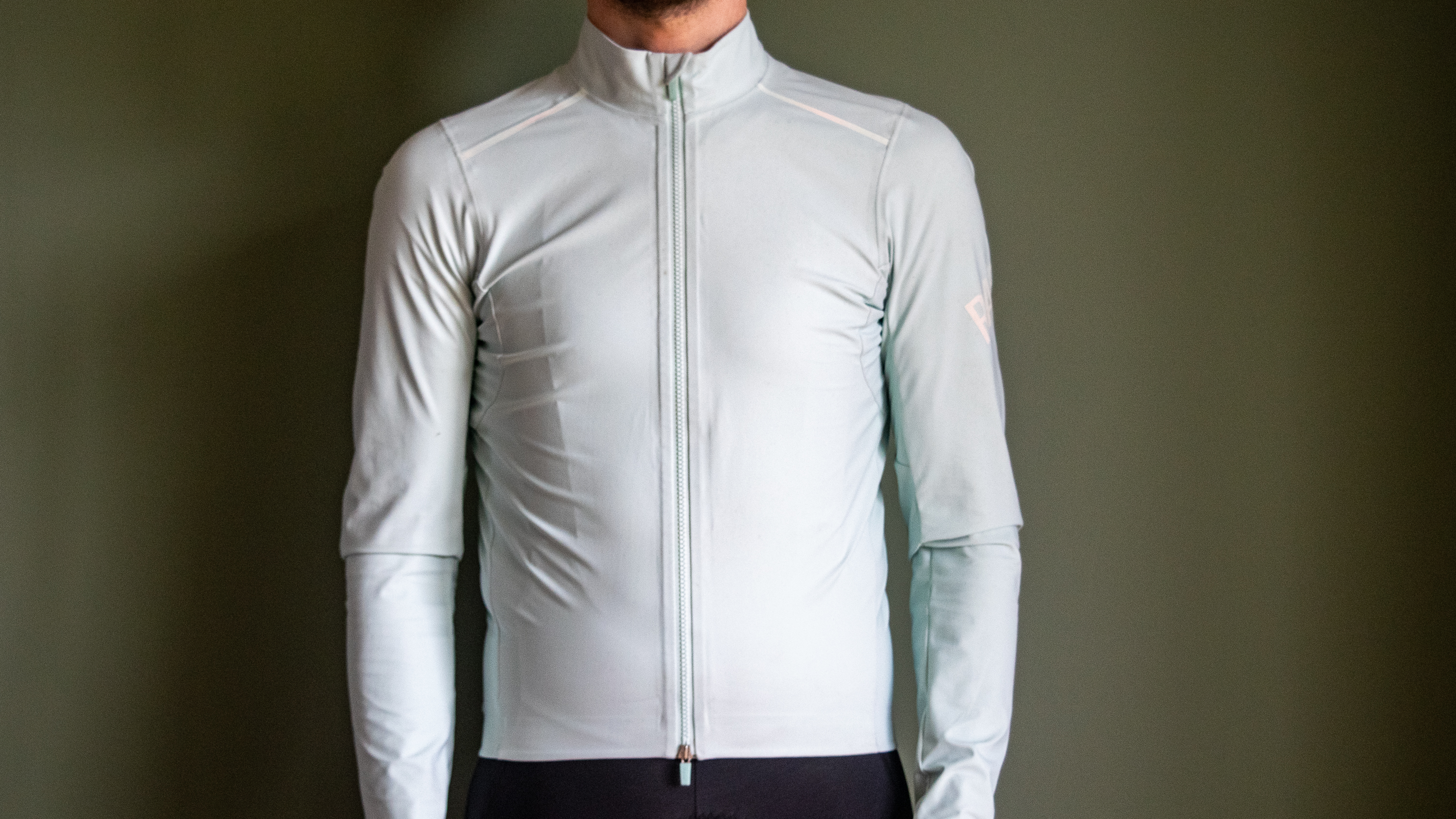 A man wearing a Rapha Shadow jersey