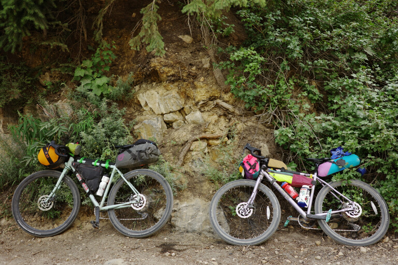 Two bikepacking bikes loaded and ready to go