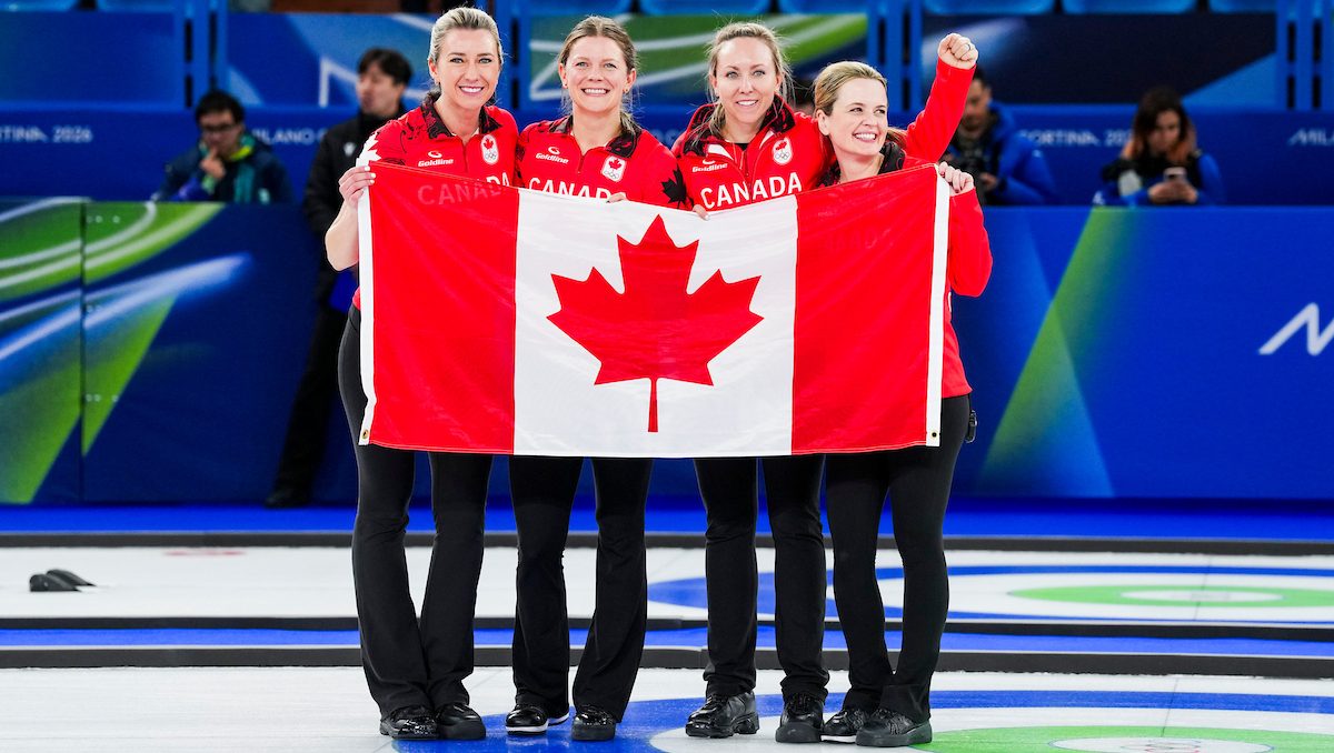 Emma Miskew, Sarah Wilkes, Rachel and Tracy Fleury celebrate