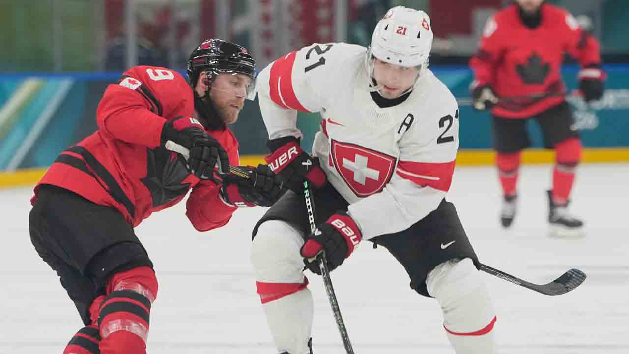 Switzerland's Kevin Fiala to miss rest of Olympics after being stretchered off against Canada