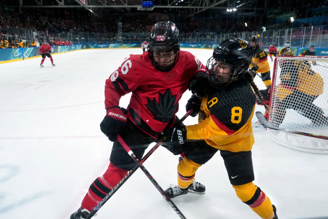 Canada's Emily Clark checks Germany's Ronja Hark