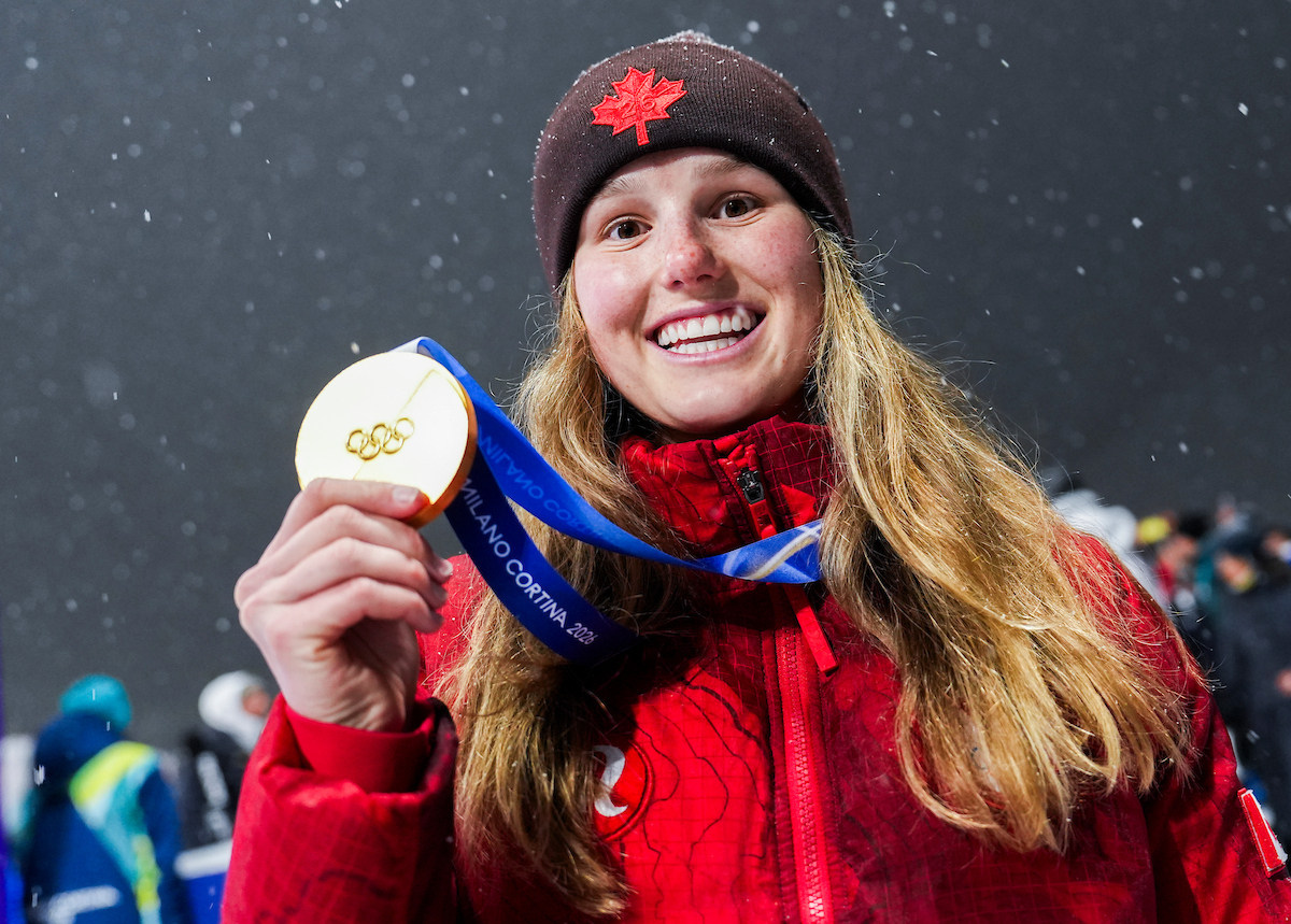 Megan Oldham holds her gold medal after the finals for Freestyle Skiing
