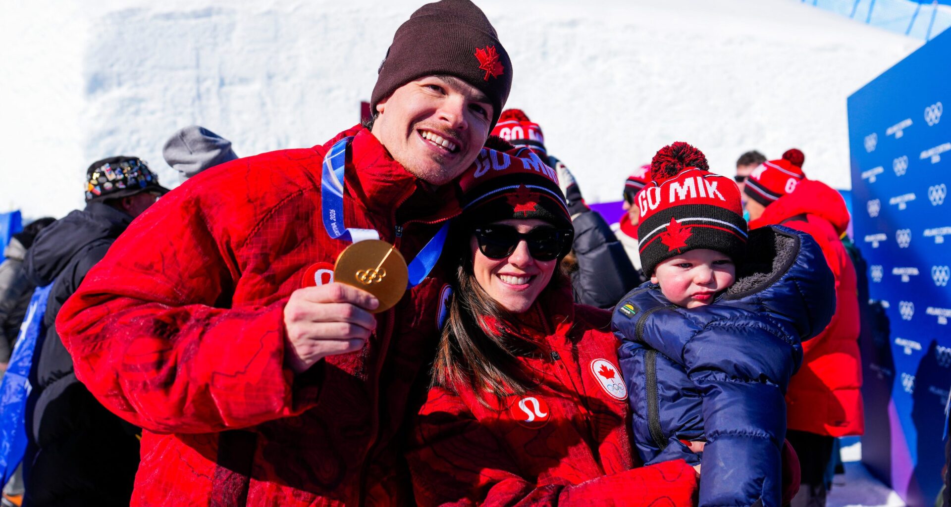 Team Canada’s Mikael Kingsbury celebrates with his family after winning a gold medal