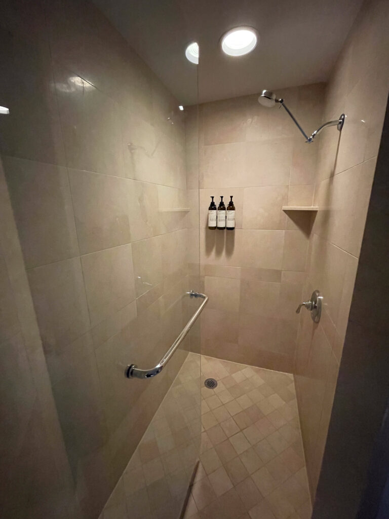 The large shower in the hotel bathroom. 