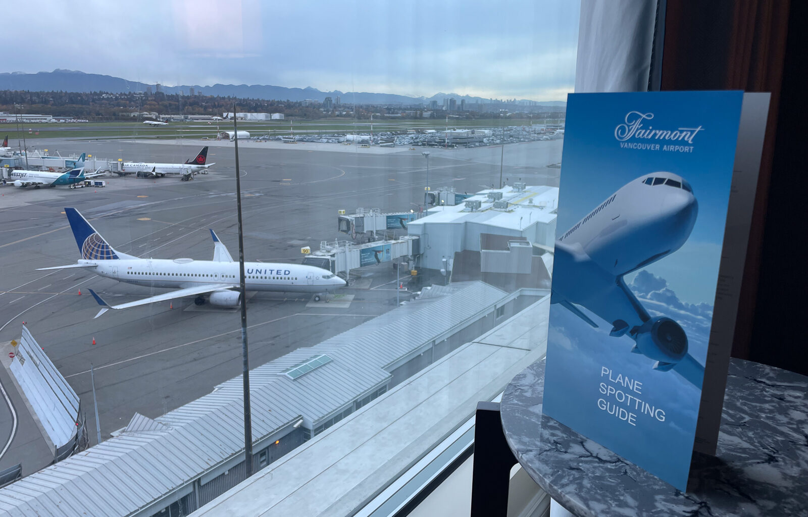 Looking out the hotel window onto the airport runway.