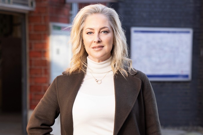 Gemma Bissix Gemma Bissix, wearing a brown jacket and white top, with long-flowing blonde hair in character as Clare Bates, stood outside of the tube station in EastEnders