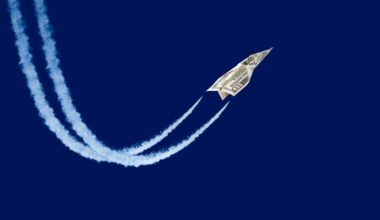 paper plane made from a ten-dollar bill 'flying' with contrails