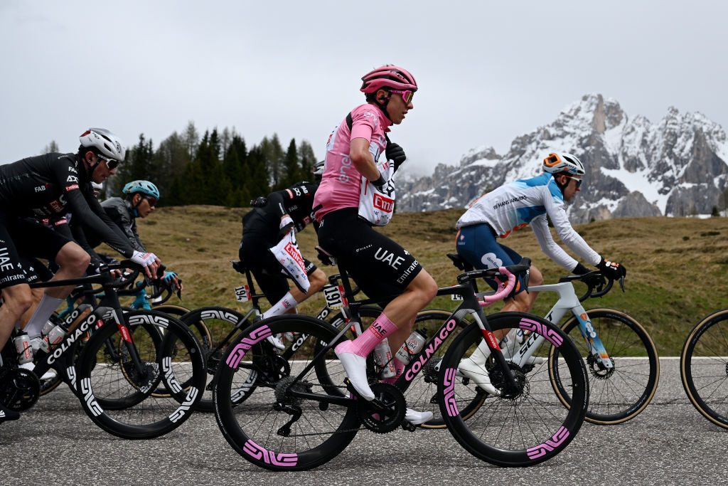 PASSO BROCON, ITALY - MAY 22: Tadej Pogacar of Slovenia and UAE Team Emirates carrying the feed for his teammates during the 107th Giro d