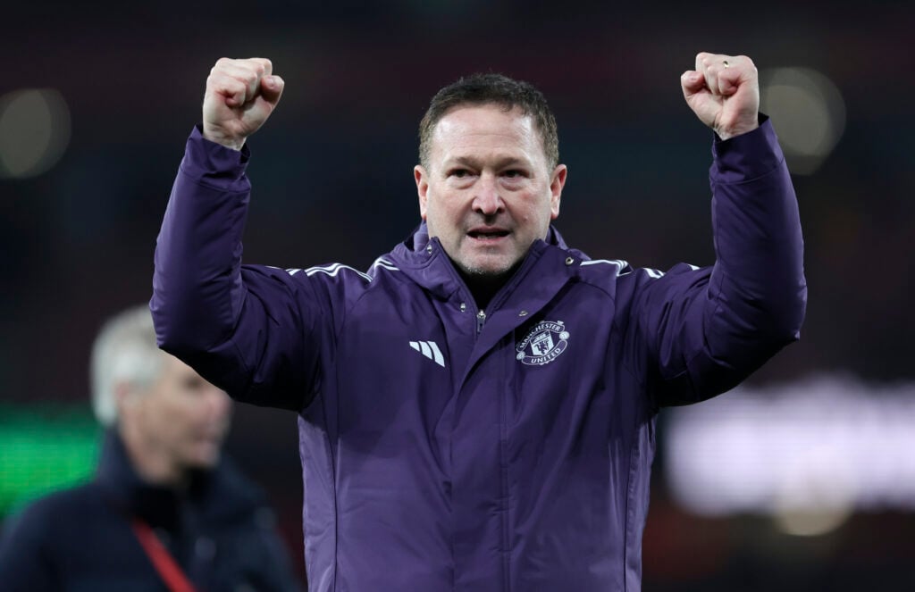 Steve Holland celebrates Manchester United win over Arsenal