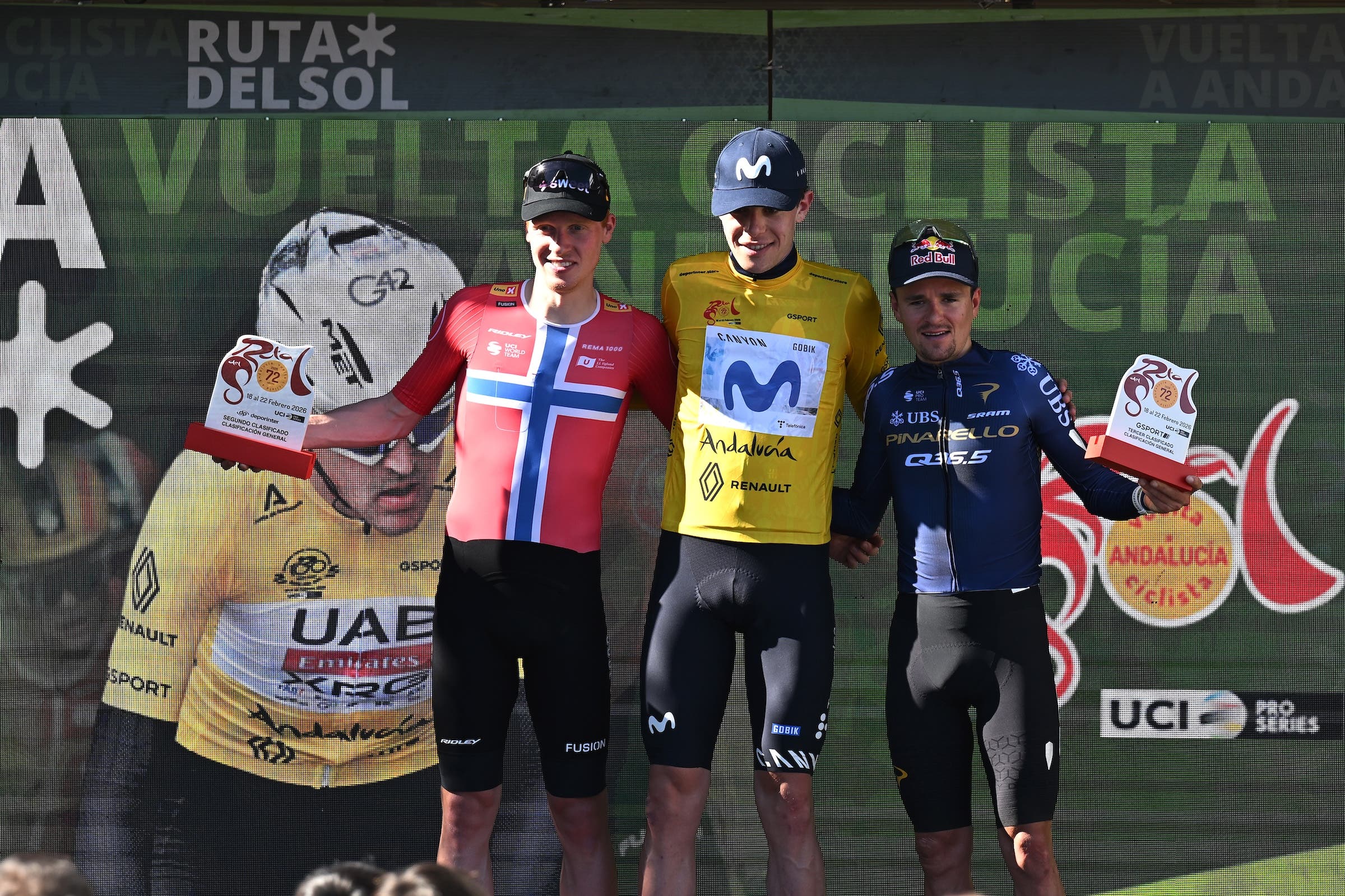 Andreas Leknessund (Team Uno-X Mobility), race winner Ivan Romeo (Team Movistar) and Tom Pidcock (Team Pinarello Q36.5 Pro Cycling) on the podium after the Vuelta a Andalucia Ruta Ciclista Del Sol 2026 (Photo: Szymon Gruchalski/Getty Images)