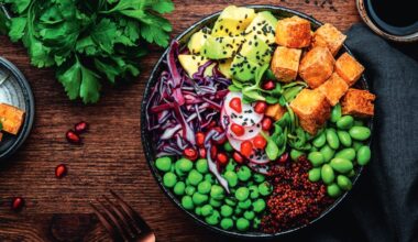 A large bowl of salad on a wooden table