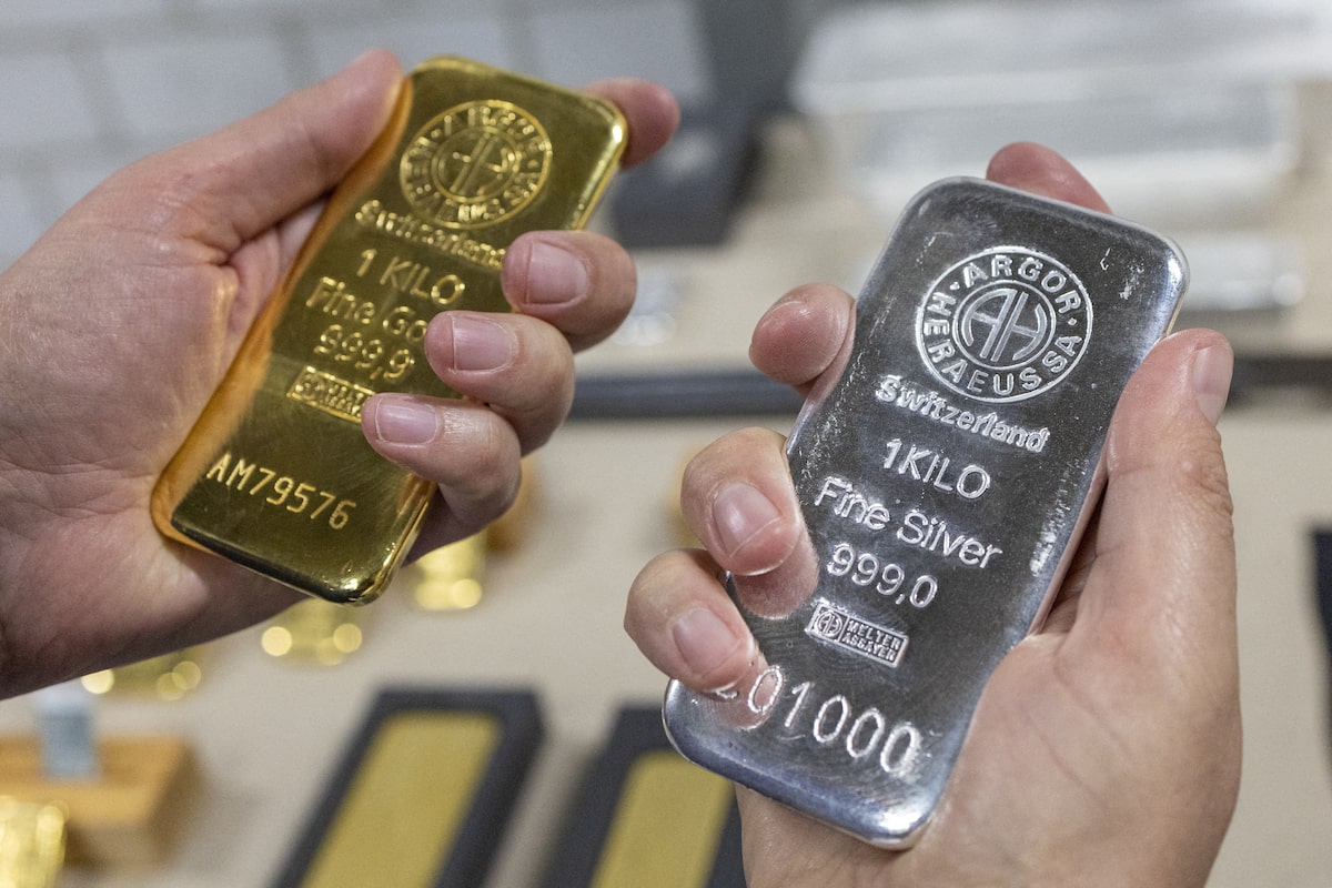 Silver tumbles, oil drops in commodity sell-off