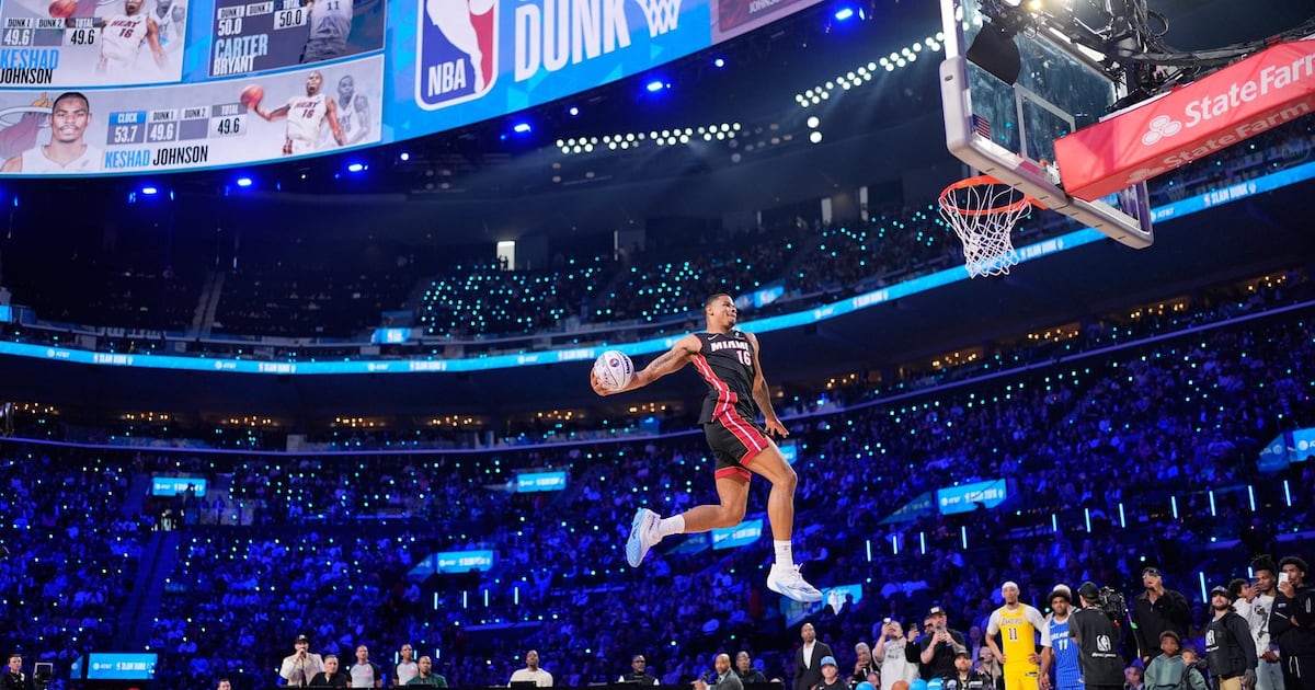 Heat's Keshad Johnson soars to a slam dunk title, edging Carter Bryant who had a perfect score
