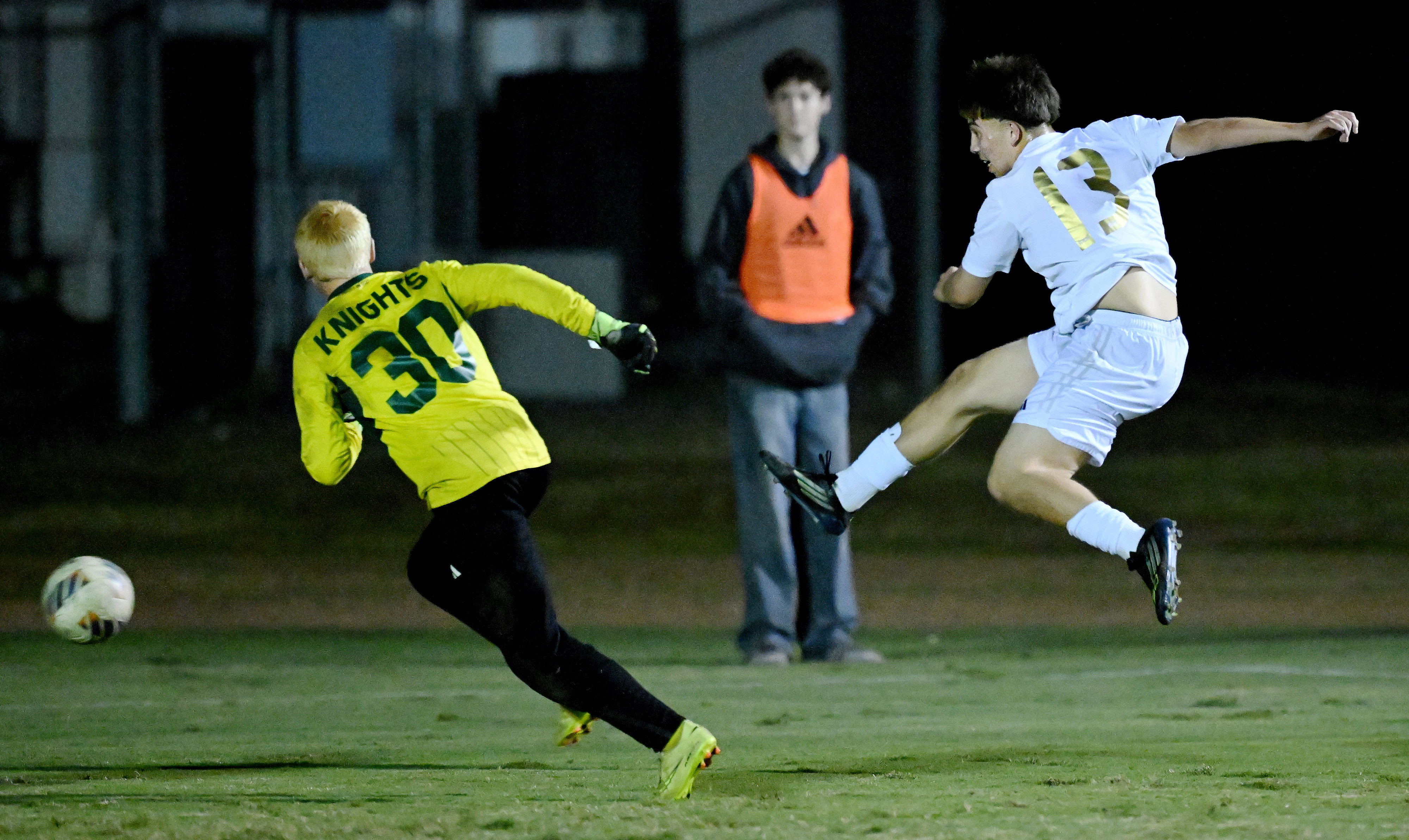 Animo Leadership forward Jeremiah Medrano (13) scores pass Ontario Christian...