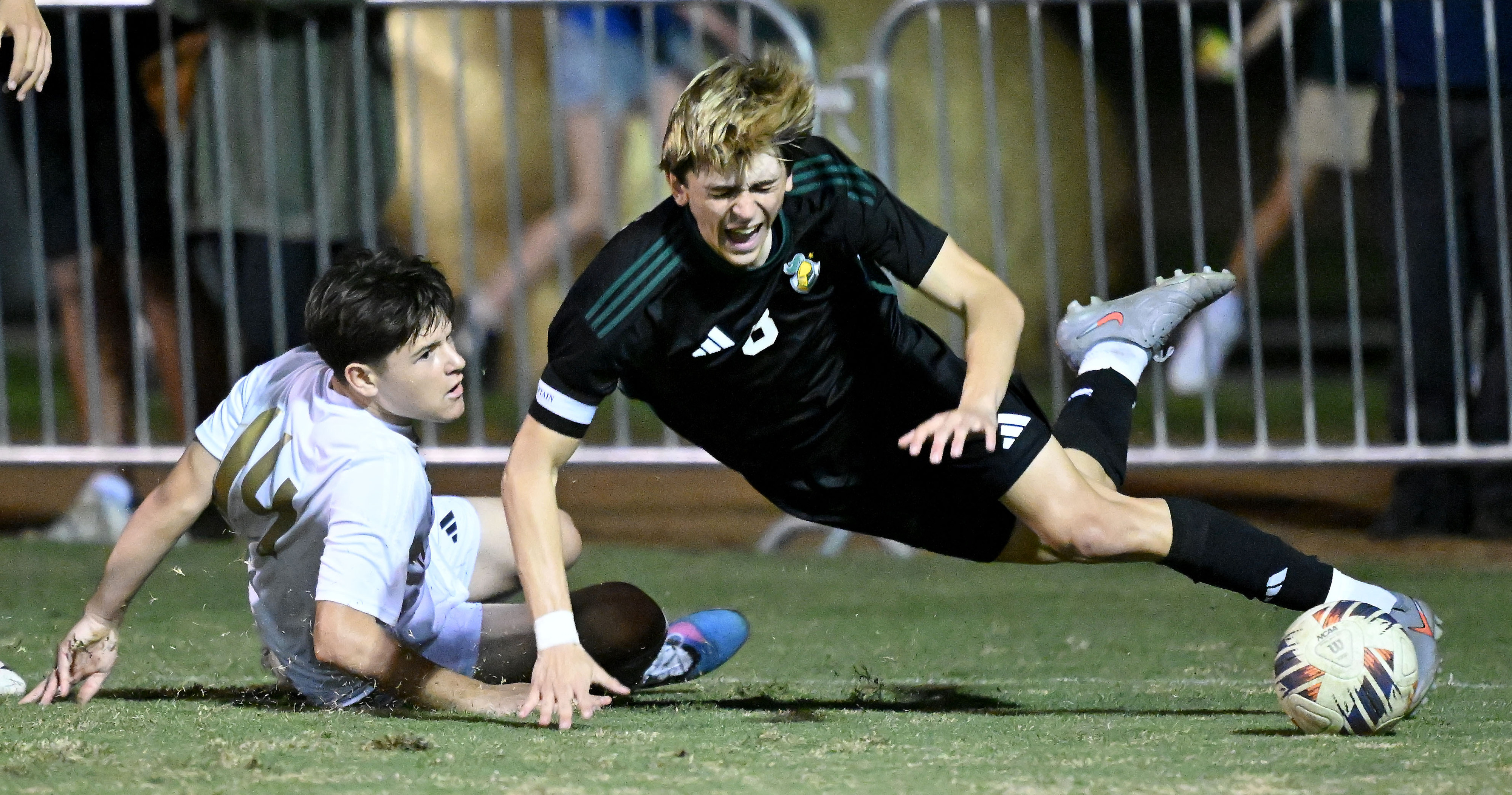 Animo Leadership defender Sebastian Medrano (14) tackles Ontario Christian defender...