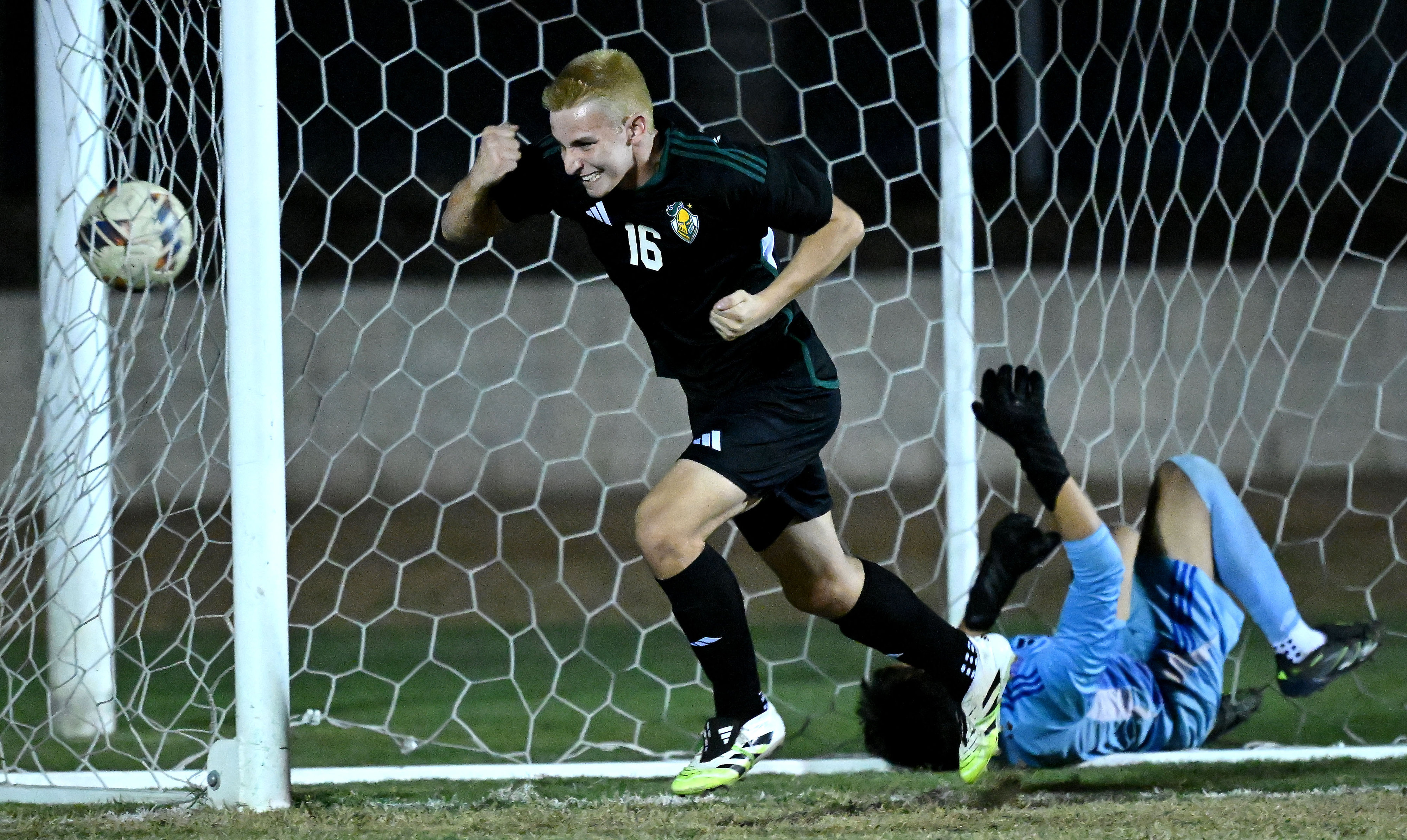 Ontario Christian defender Dalton Stott (16) celebrates his goal as...