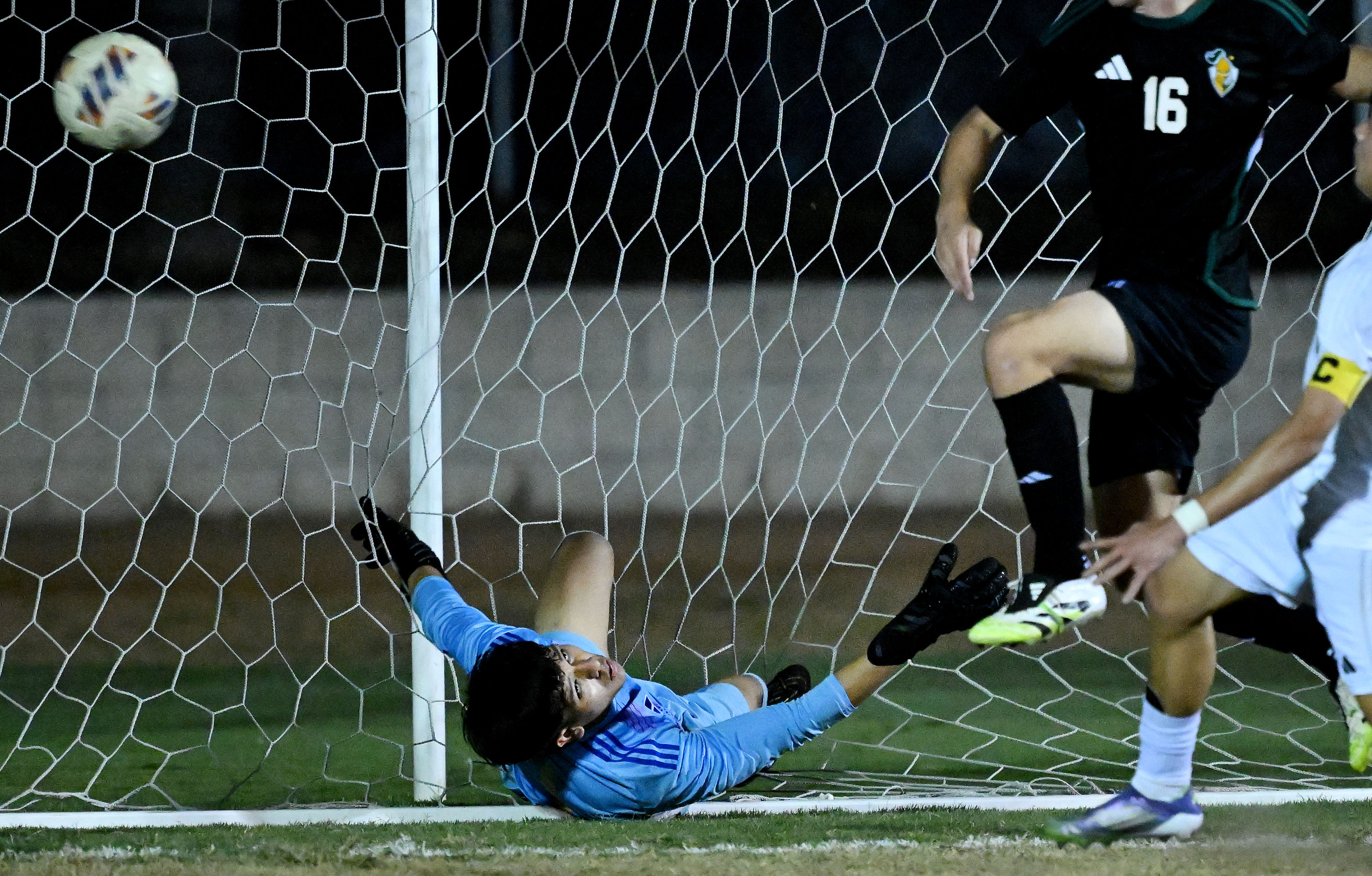 Animo Leadership goalkeeper Fernando Hernandez (1) can only watch as...