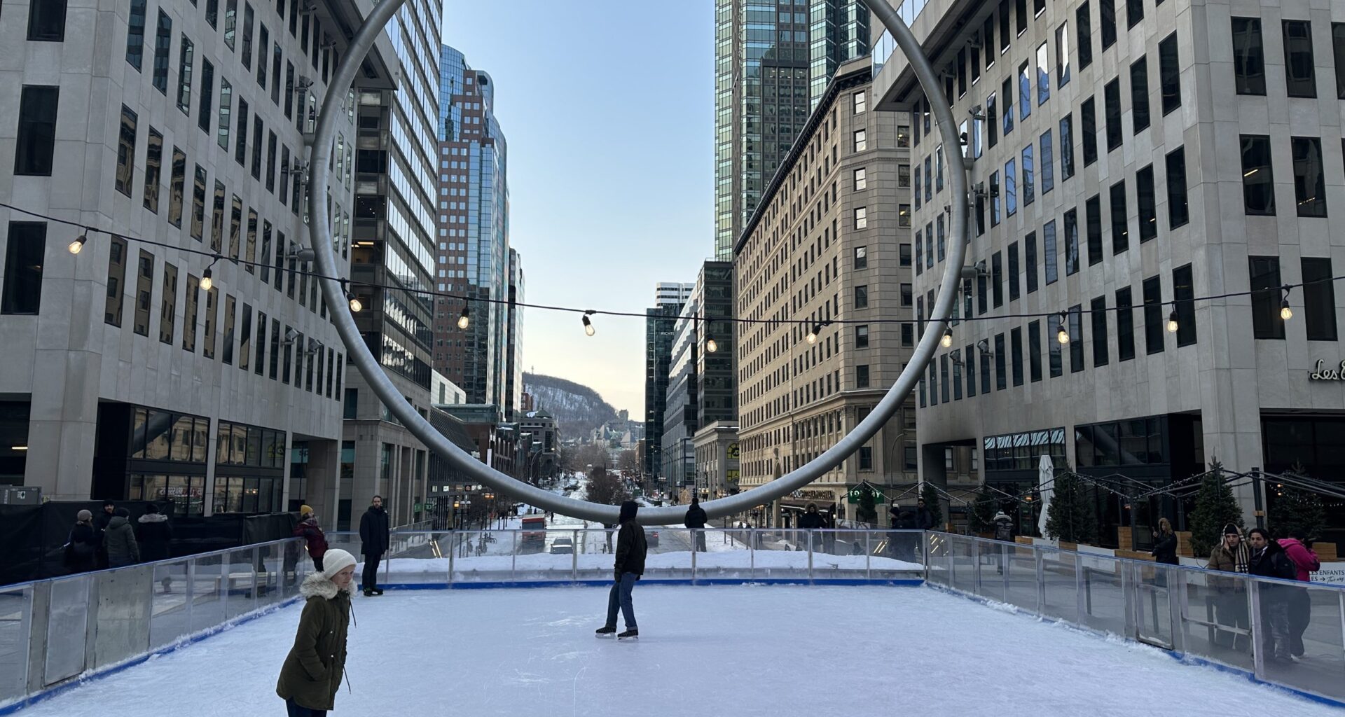 Montrealers glide beneath Place Ville Marie’s ring at new downtown rink