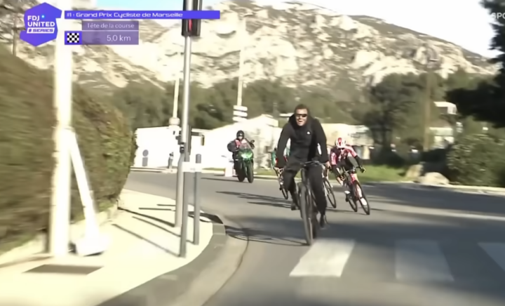 Fan rides onto race course