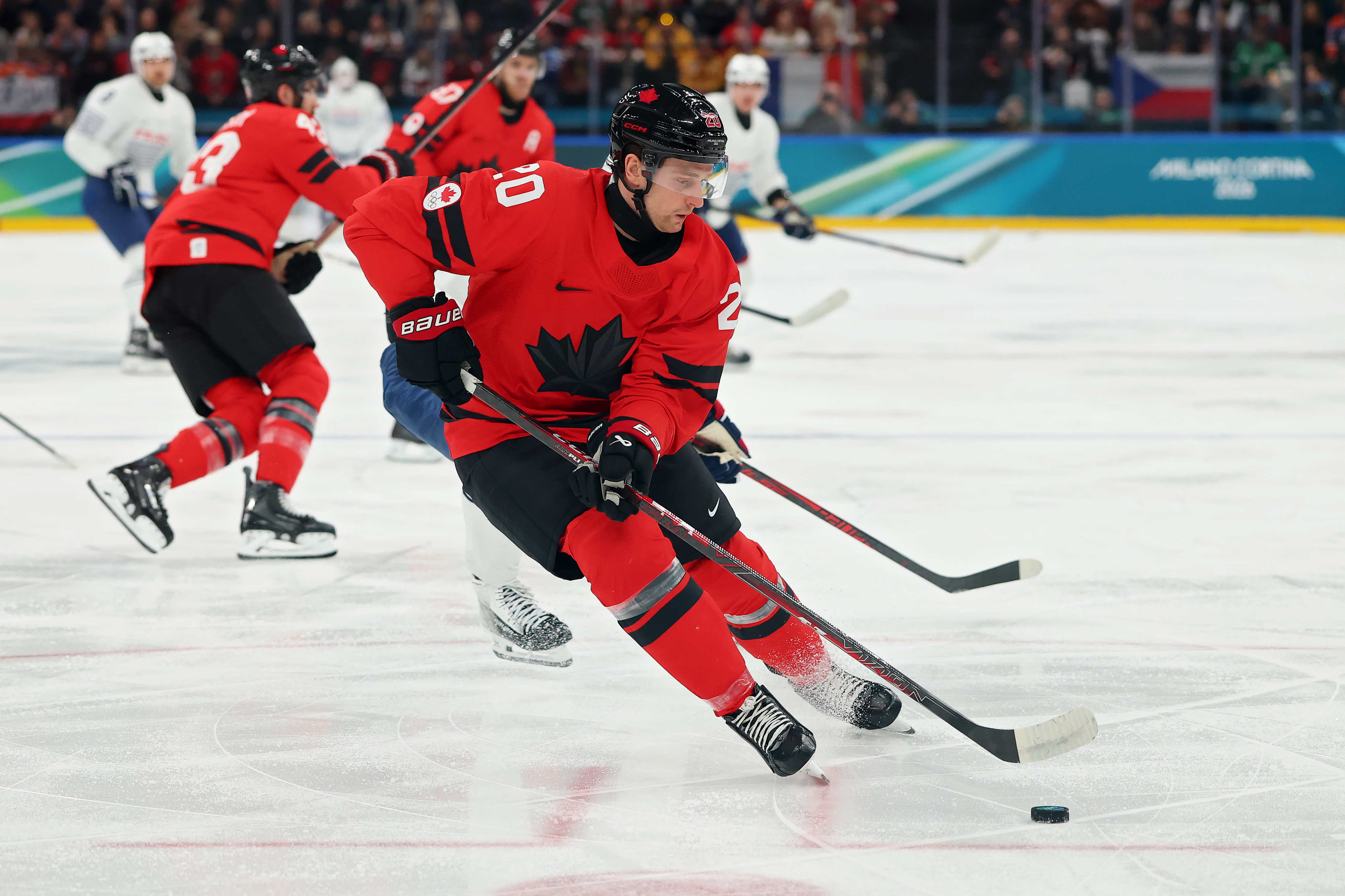 Thomas Harley #20 of Team Canada skates with the puck in the first period during the Men's Preliminary Group A match between Canada and France on day nine of the Milano Cortina 2026 Winter Olympic games at Milano Santagiulia Ice Hockey Arena on Feb. 15, 2026 in Milan, Italy. (Photo by Gregory Shamus/Getty Images)