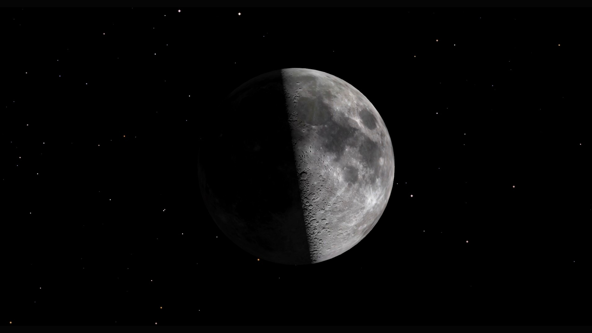 A close up of the moon in space, its left half obscured by shadow with its right half illuminated by an off-camera sun, revealing dark maria spots and lighter areas