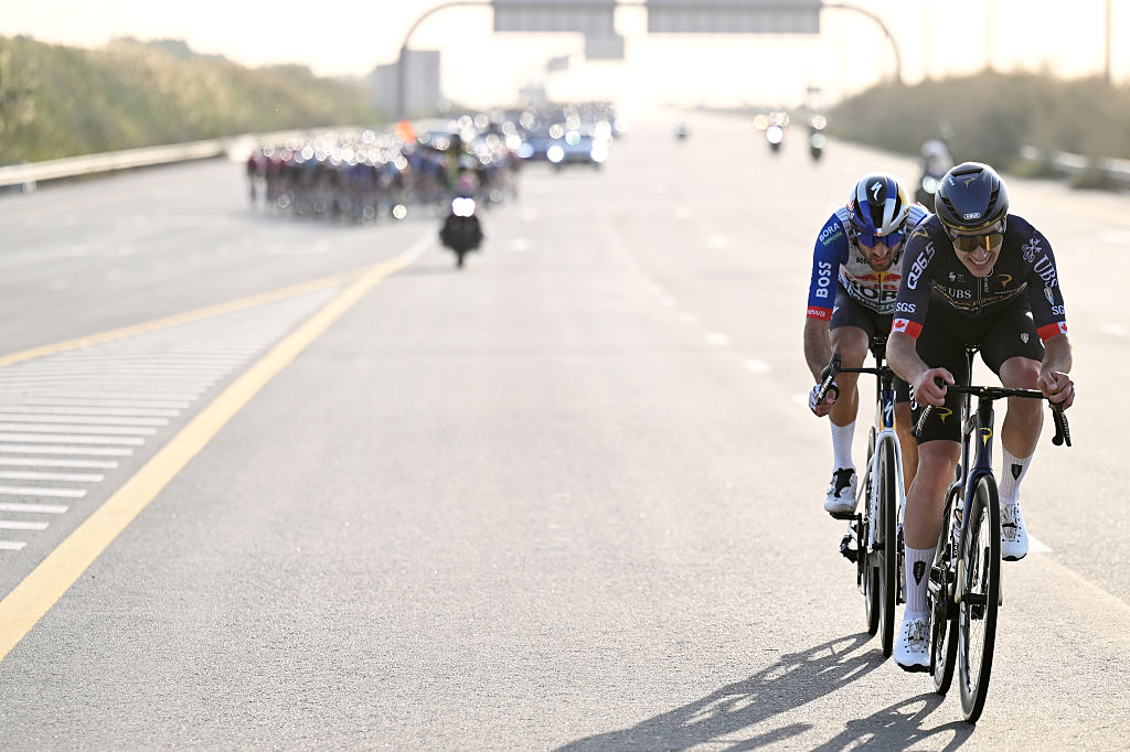DUBAI, UNITED ARAB EMIRATES - FEBRUARY 20: (L-R) Gianni Moscon of Italy and Team Red Bull - BORA - hansgrohe and Nickolas Zukowsky of Canada and Team Pinarello Q36.5 Pro Cycling compete in the breakaway during the 8th UAE Tour 2026, Stage 5 a 168km stage from Dubai Al Mamzar Park to Hamdan Bin Mohammed Smart University / #UCIWT / on February 20, 2026 in Dubai, United Arab Emirates. (Photo by Tim de Waele/Getty Images)