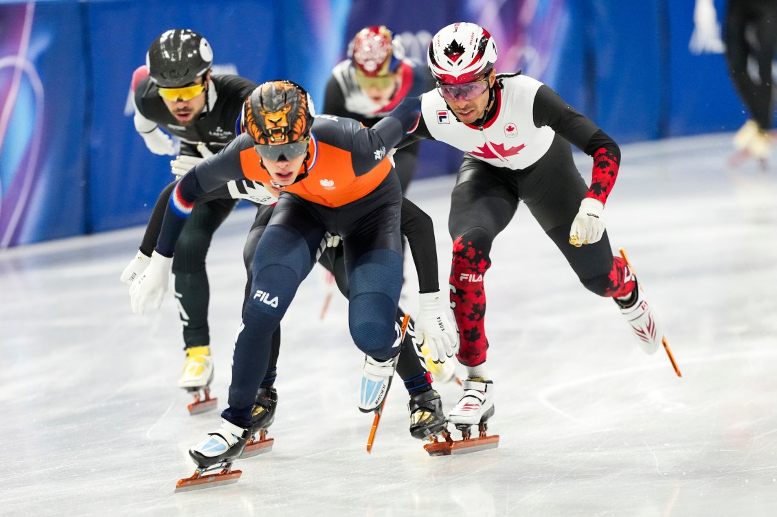 Team Canada’s William Dandjinou competes in Short Track Speed Skating Men's 1500m finals