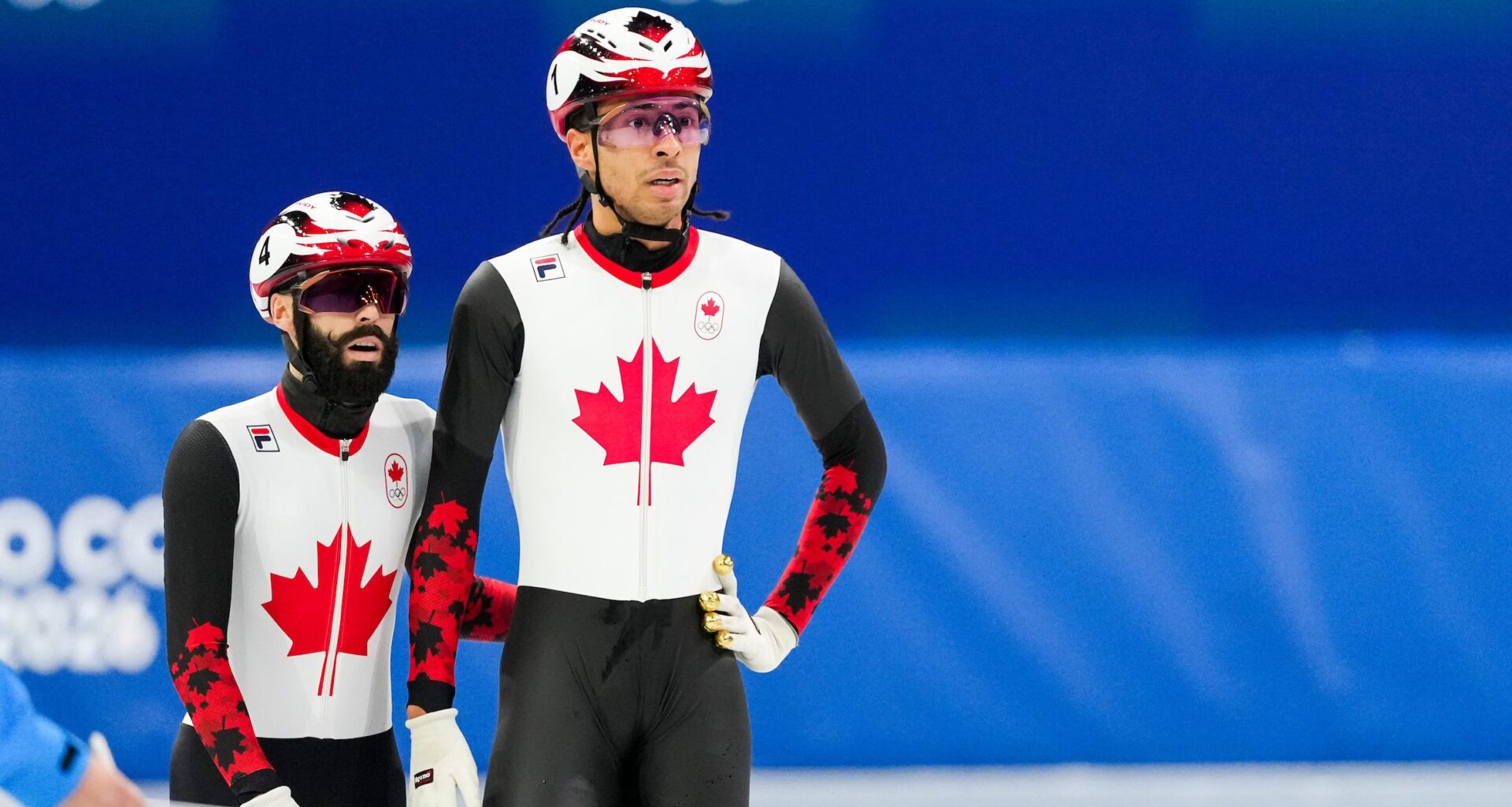 Steven Dubois and William Dandjinou react after the men's 1500m final