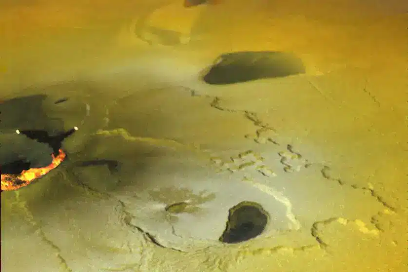 Lava Flows And Volcanic Pits On Io's Surface.