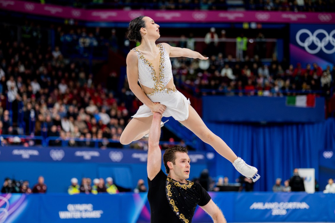 Lia Pereira lifted in air by Trennt Michaud during pairs free program.