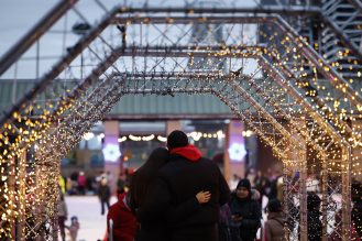 Couple standing arm and arm