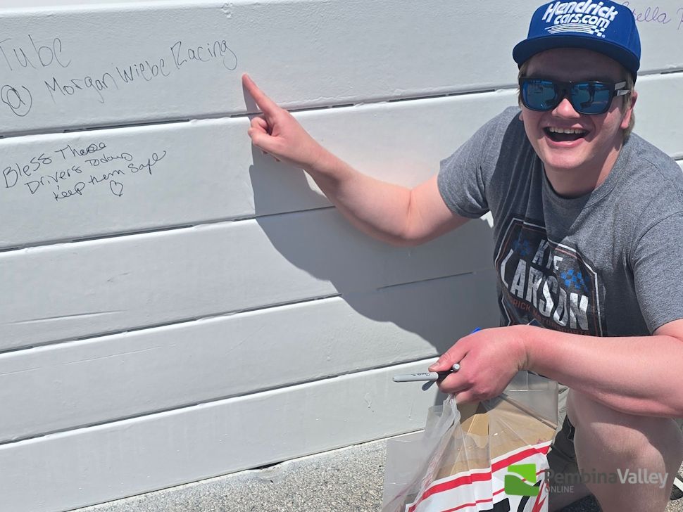 Morgan even got to sign the wall at The Kansas Speedway