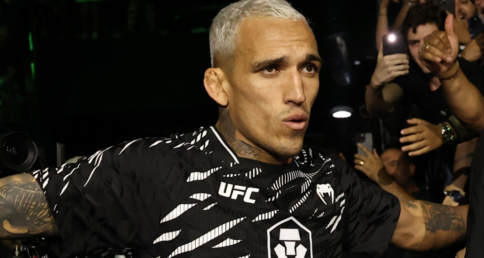 Charles Oliveira watches to the Octagon at UFC Rio