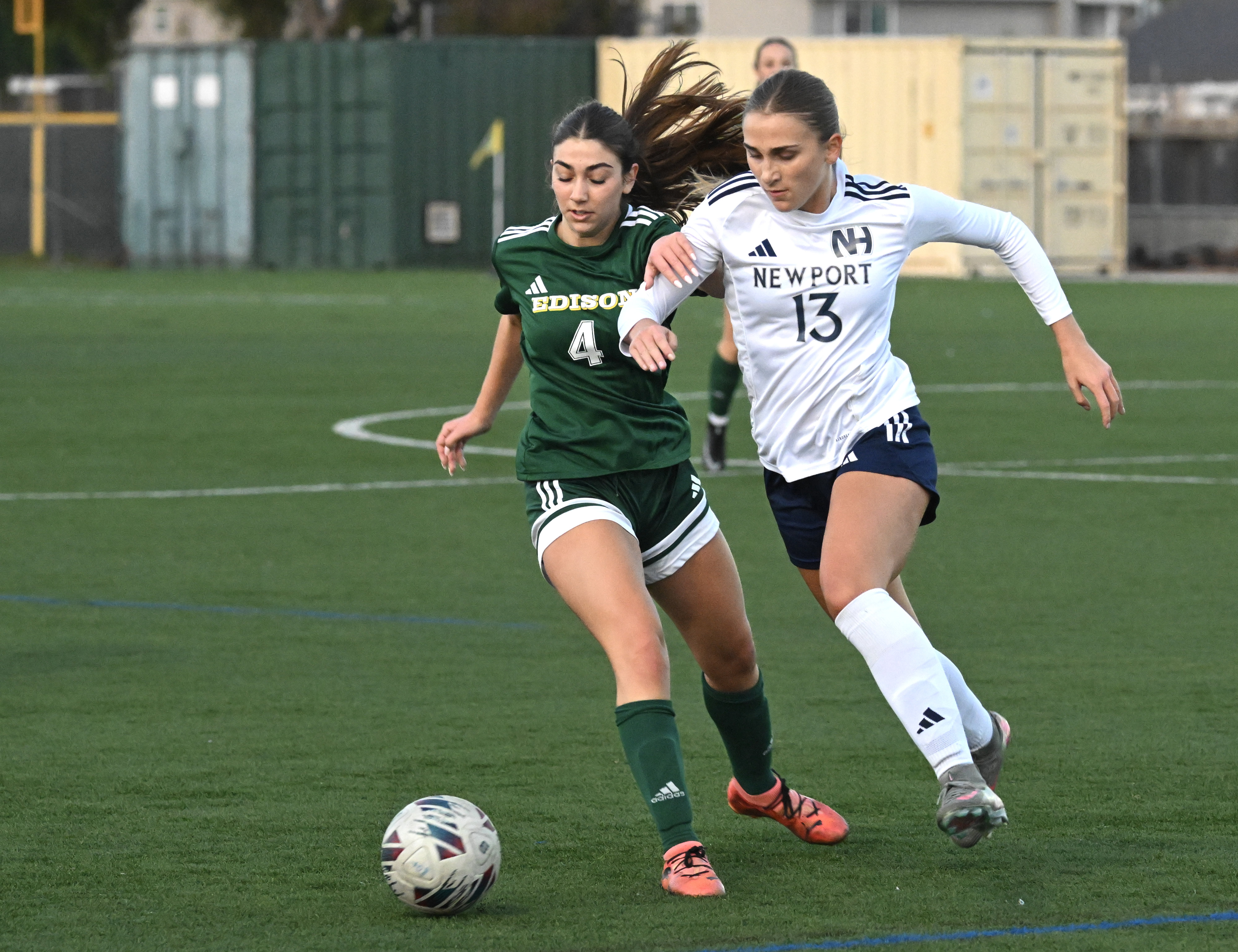 Edisonâs Audrey Scrimgeour (4) and Newport Leah Showalter (13) battle...