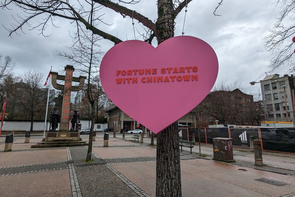 A Love Your City sign in Chinatown