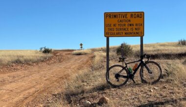Patagonia road sign with bike on route