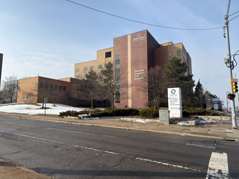 Exterior of Pontiac General Hospital seen from across the street