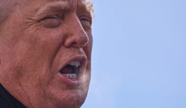 Close up of United States president Donald Trump's face in three-quarters profile.