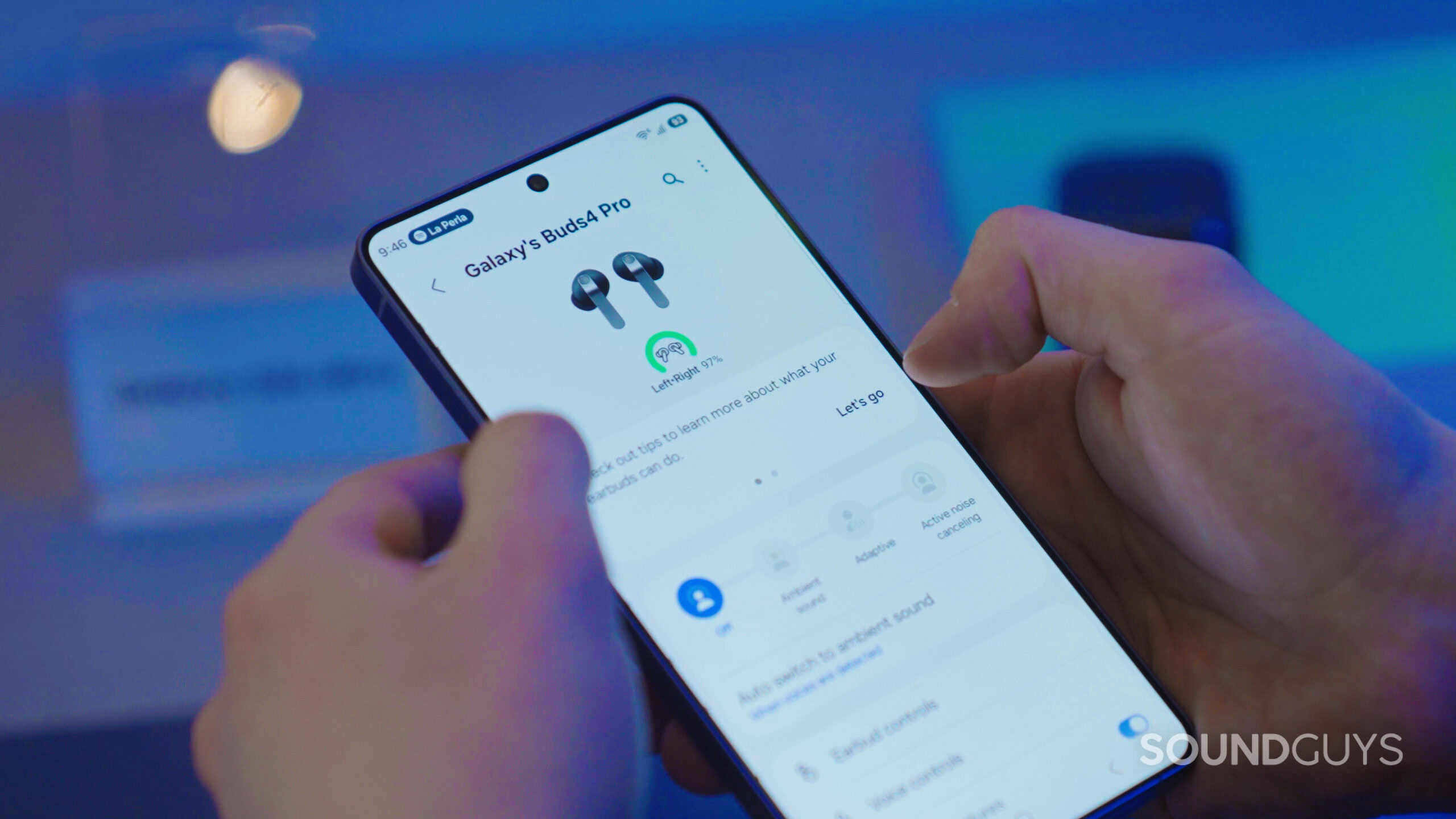 Samsung Galaxy S26 with Galaxy Buds 4 Settings on screen
