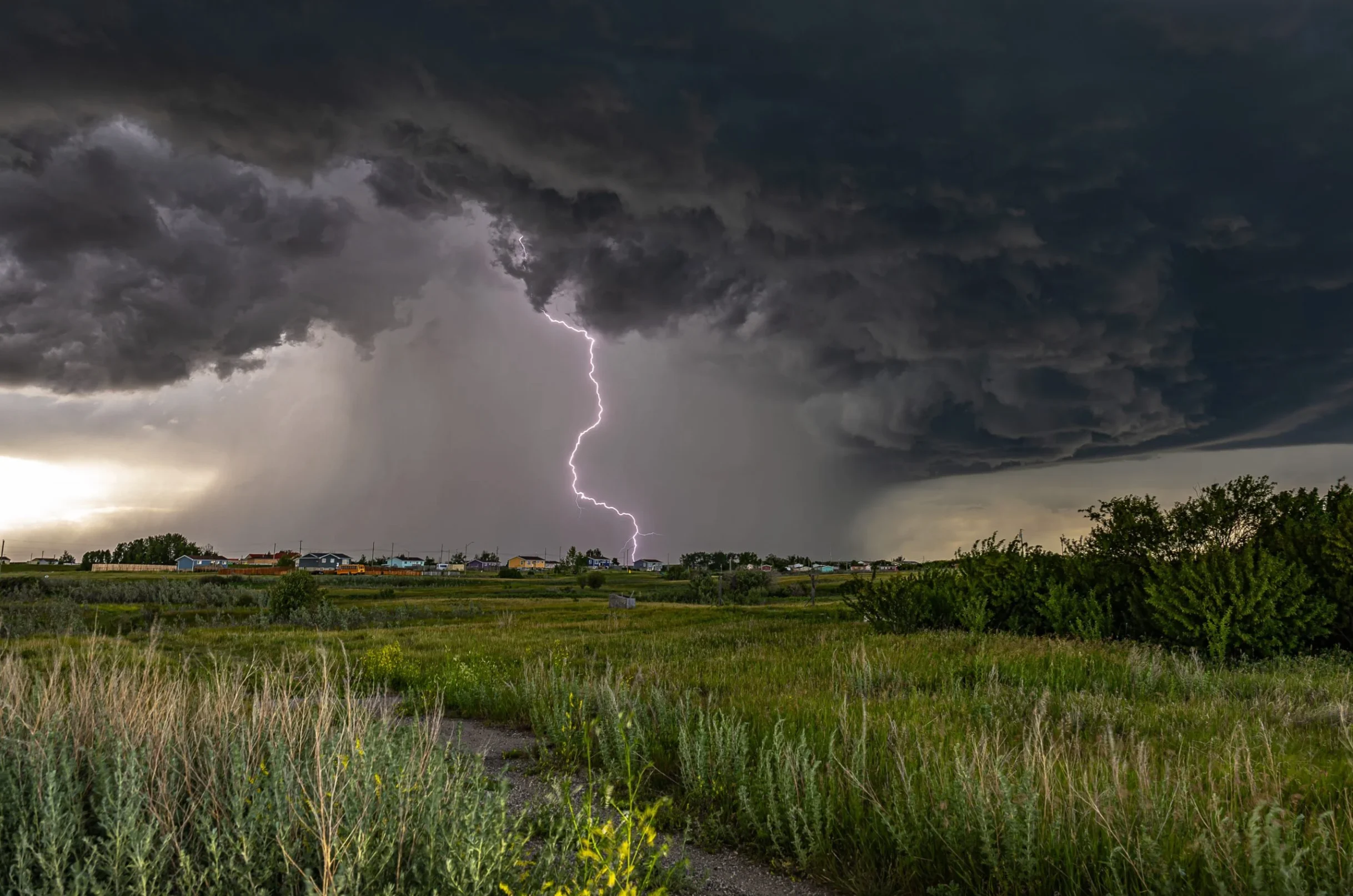 No re-use: Canadian Geographic - Winner: Matt Melnyk Lightning strikes as a severe storm tracks southeast of Calgary on a summer afternoon.