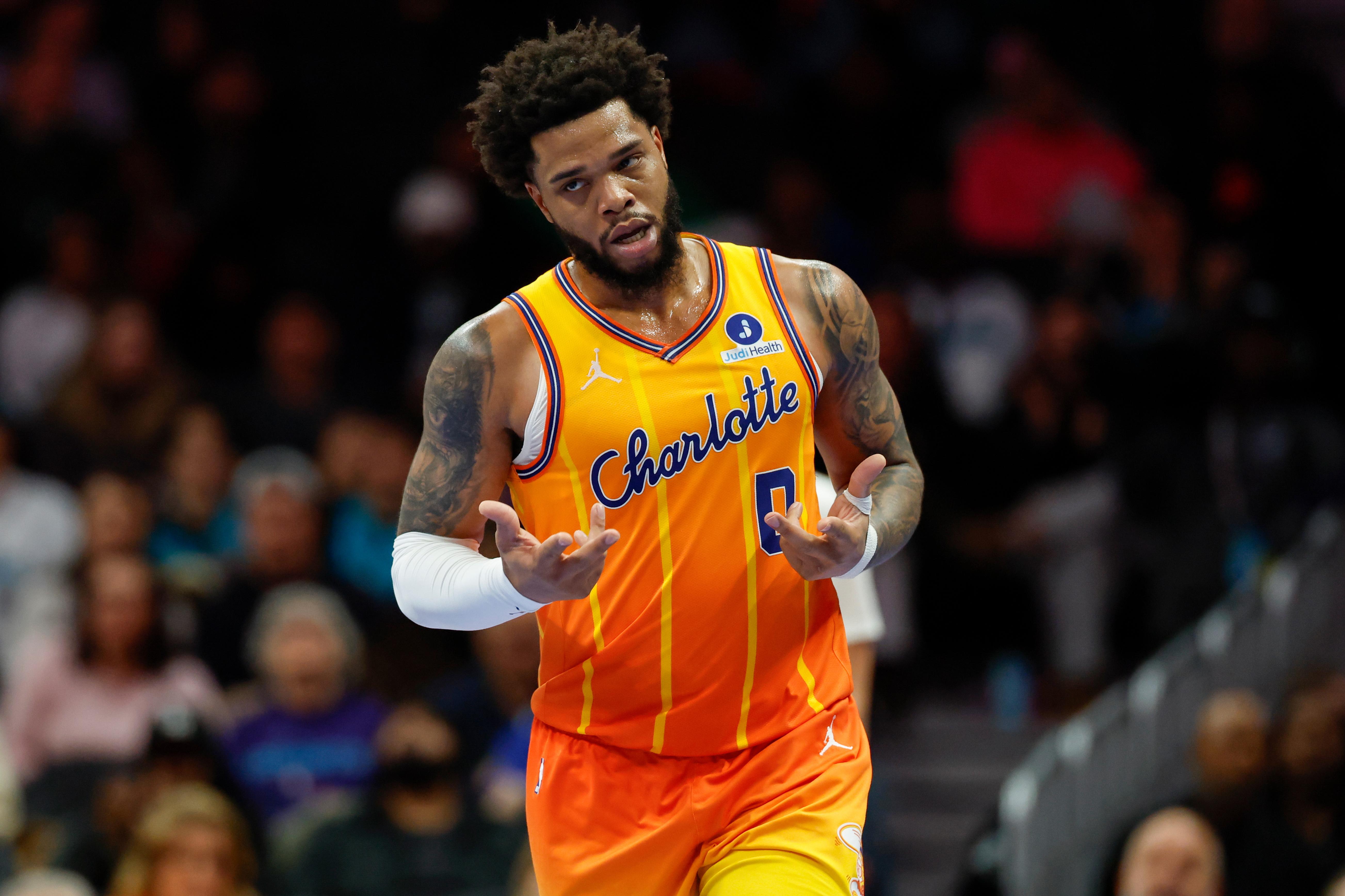 FILE – Charlotte Hornets forward Miles Bridges makes the “6-7”...