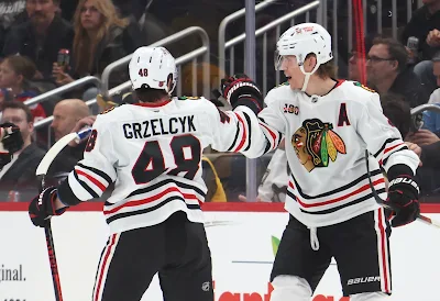Chicago Blackhawks defencemen Matt Grzelcyk and Connor Murphy