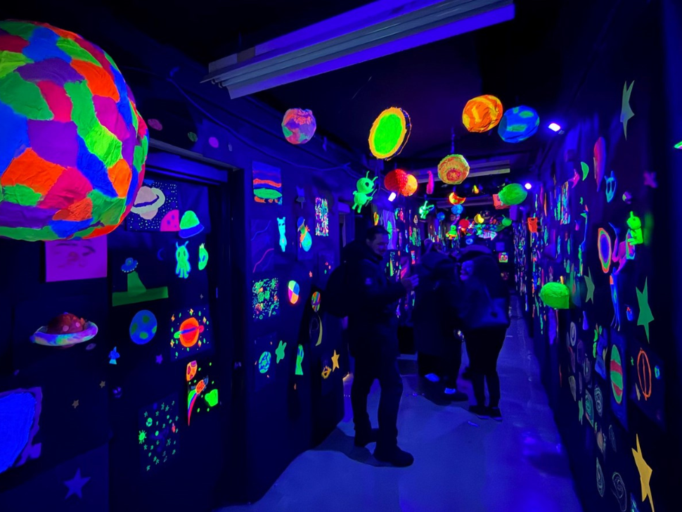 Winnipeg school’s annual Glow Show brings families together through art