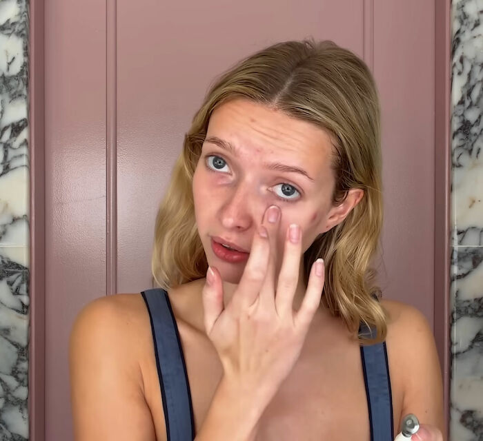 Apple Martin applying skincare in a bathroom, revealing cosmetic procedures she has had and discussing beauty treatments. Apple Martin applying skincare in a bathroom, revealing cosmetic procedures she has had and discussing beauty treatments.