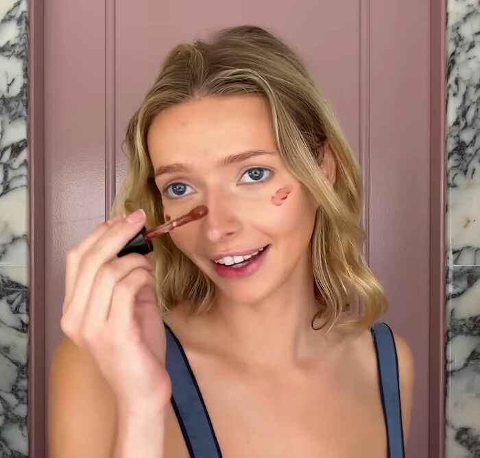 Apple Martin, Gwyneth Paltrow's nepo baby, applying makeup while discussing cosmetic procedures on her face. Apple Martin, Gwyneth Paltrow's nepo baby, applying makeup while discussing cosmetic procedures on her face.