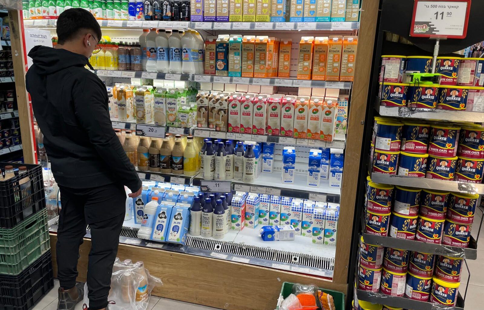 The dairy counter in a Jerusalem supermarket offering the cow-free New Milk by tech company Remilk among regular dairy options and other milk substitutes on January 29, 2026. (Rossella Tercatin/Times of Israel)