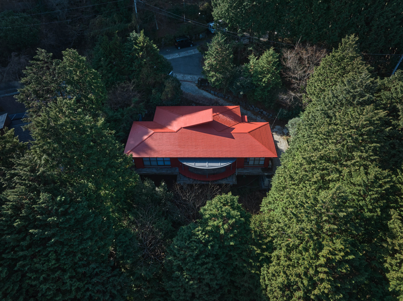 elevated circular veranda and canopy wrap 60-year-old restored japanese house