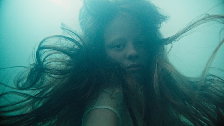 Mia Goth as Hannah, being dreamy underwater in A Cure for Wellness