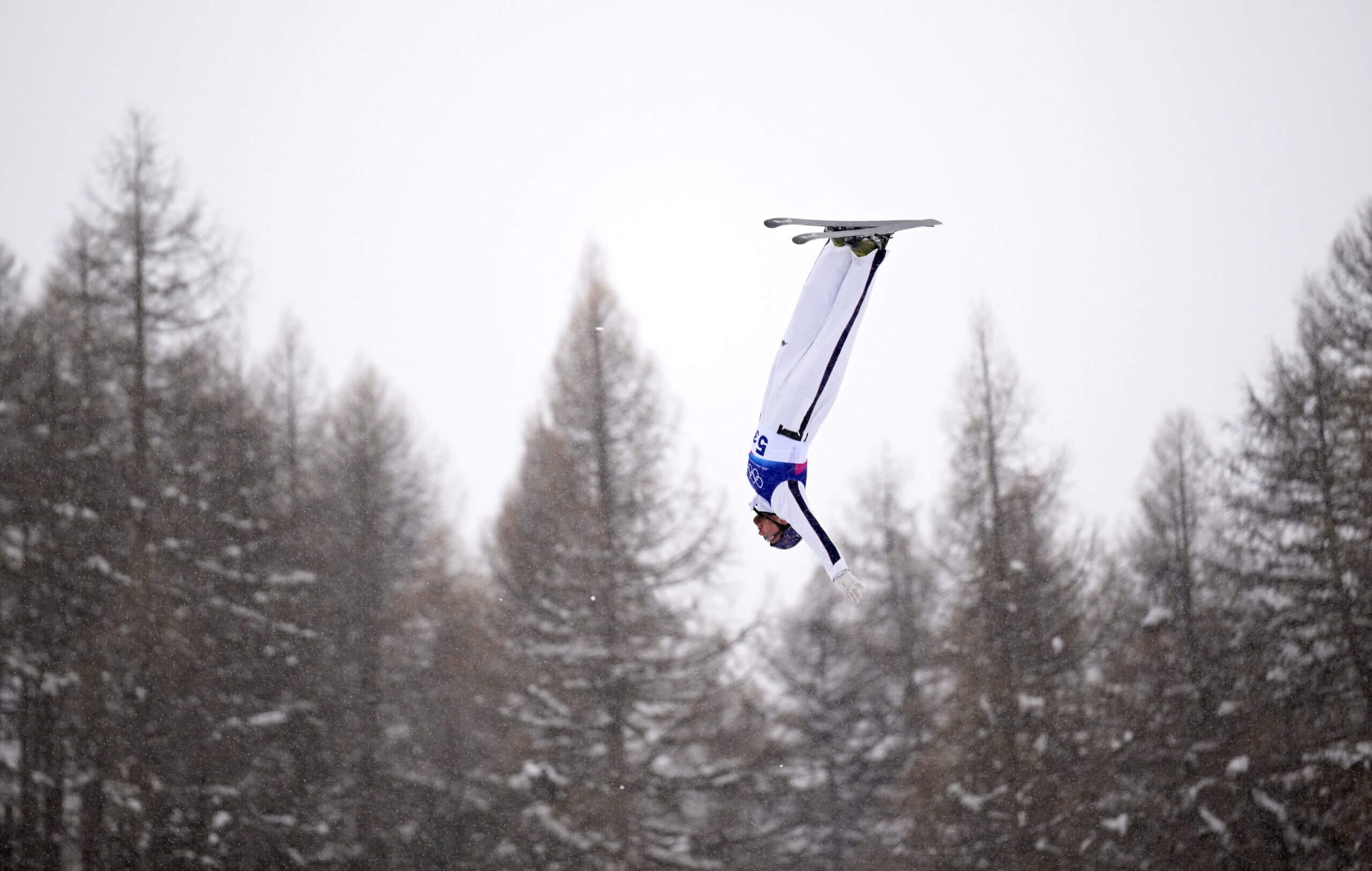 Christopher Lillis of United States soars at the mixed team aerials final at the Livigno Aerials & Moguls Park Feb. 21, 2026.